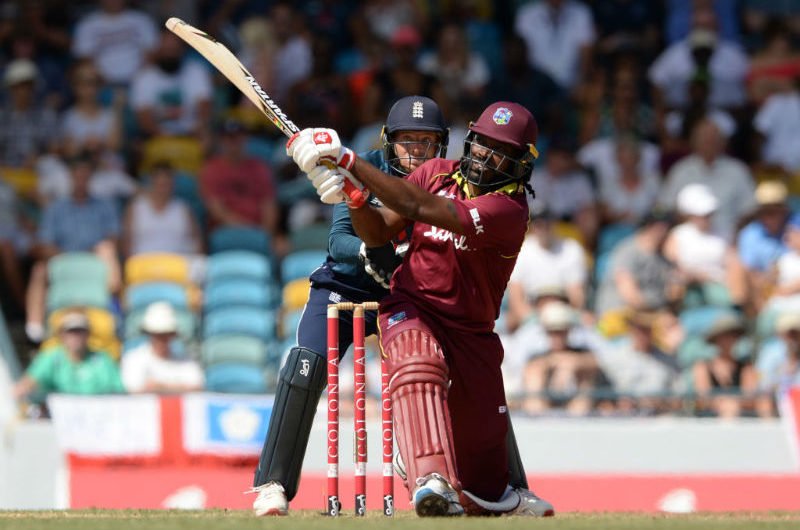 Chris Gayle sends one over the deep mid-wicket fence