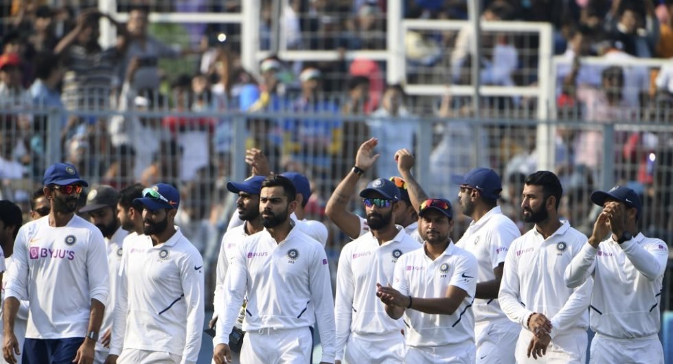 Virat Kohli leading the India Test cricket team on a victory lap