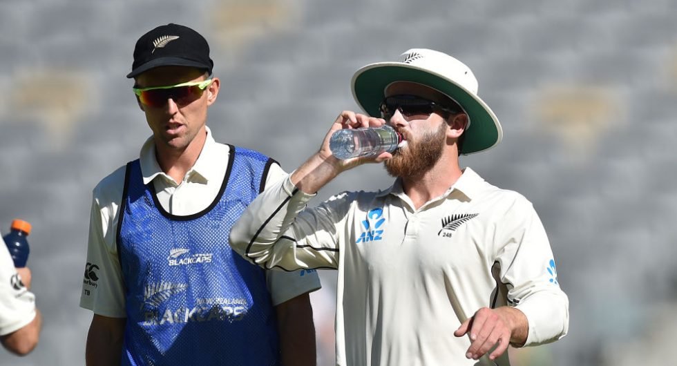 Kane Williamson has a drink to battle the Australian heat
