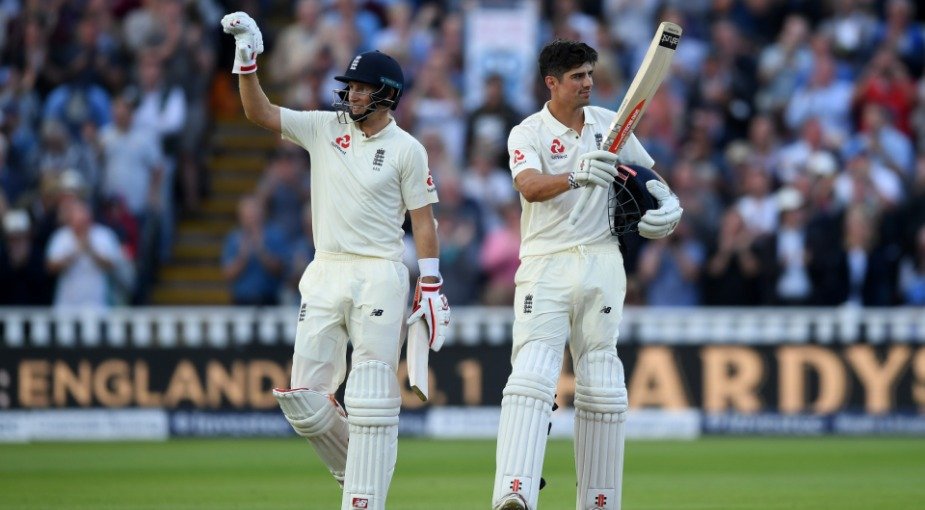 Alastair Cook acknowledges the crowd after reaching a hundred for England