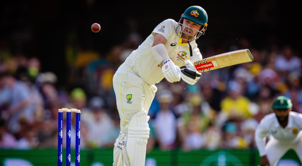 Australia's Travis Head drives during day one of the first cricket Test match between Australia and South Africa at the Gabba