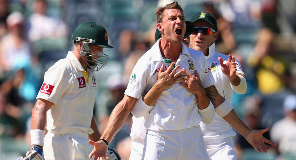 Dale Steyn of South Africa celebrates dismissing Michael Hussey of Australia during day four of the Third Test Match between Australia and South Africa