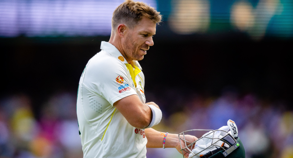 David Warner walks off after being dismissed by South Africa's Kagiso Rabada during day one of the first cricket Test match between Australia and South Africa at the Gabba