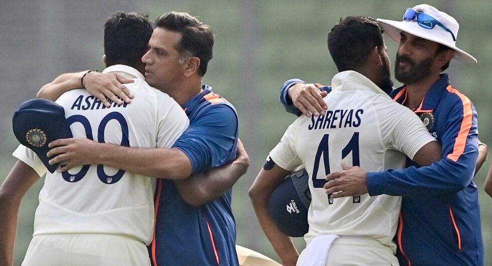 India coach Rahul Dravid congratulates R Ashwin as batting coach Vikram Rathour hugs Shreyas Iyer after winning second Test match between Bangladesh and India in Mirpur 2022/23