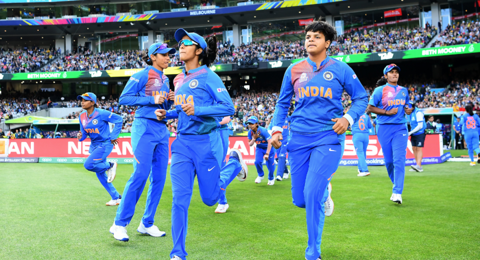 India runs out onto the field during the ICC Women's T20 Cricket World Cup Final match between India and Australia at the Melbourne Cricket Ground