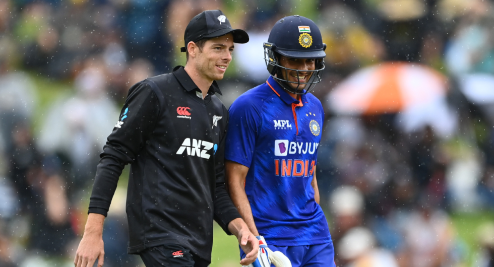 Mitchell Santner of the Black Caps walks off with Shubman Gill of India during a rain delay during game two of the One Day International series between New Zealand and India | IND vs NZ squads