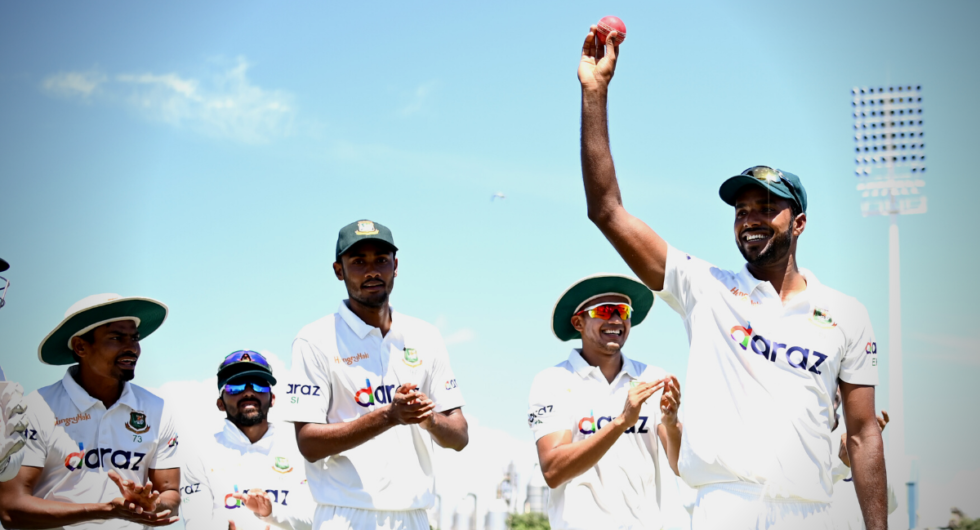 Ebadot Hossain of Bangladesh is clapped off the field after claiming six wickets during day five of the First Test Match in the series between New Zealand and Bangladesh