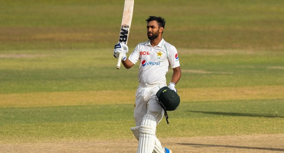 Abdullah Shafique celebrates after scoring a century during the fourth day of the first cricket Test match between Sri Lanka and Pakistan at the Galle International Cricket Stadium in Galle on July 19, 2022.