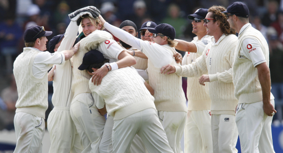 England is swamped by team mates after taking the wicket of Stephen Fleming