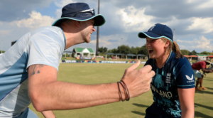 Chris Guest, Head Coach of England, celebrates with Grace Scrivens of England