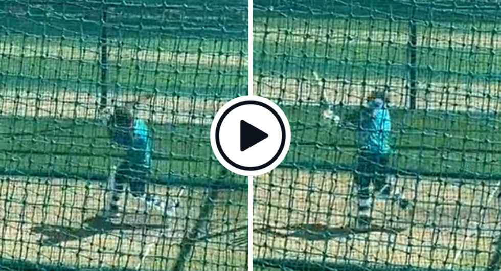 David Warner bats left- and right-handed at the nets