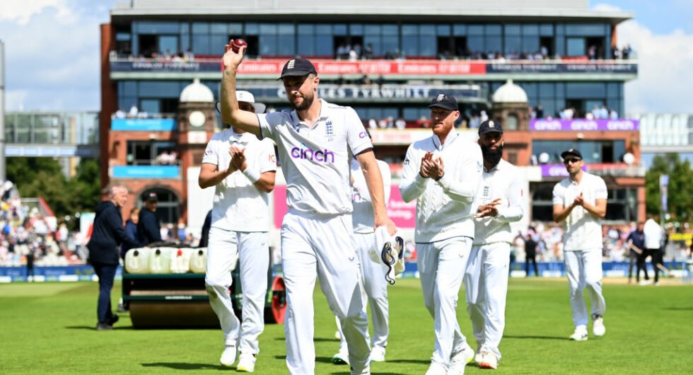 Chris Woakes raises the ball after taking his first Ashes five-for