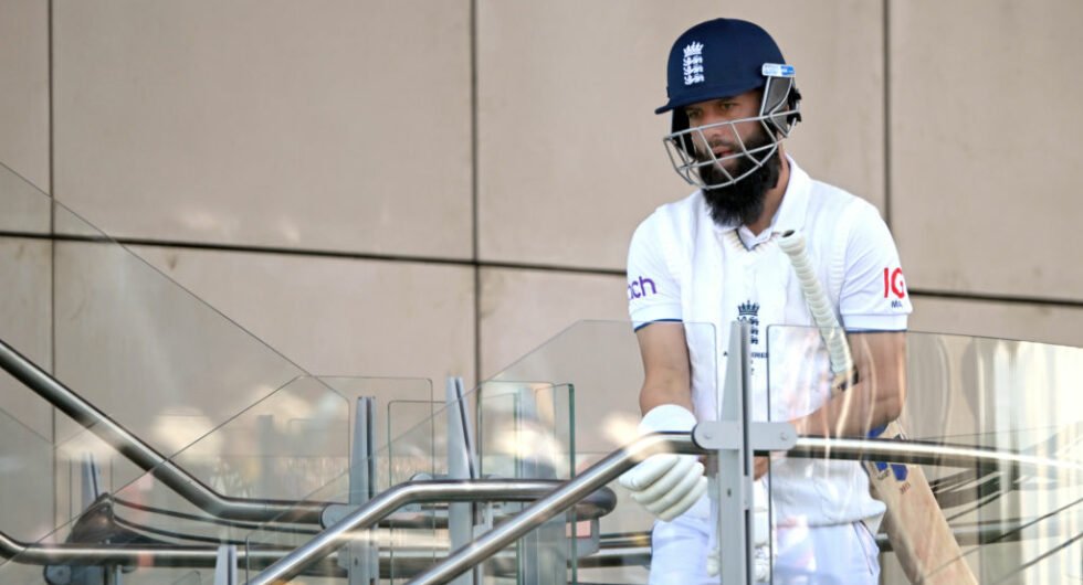 Moeen Ali walks out to bat