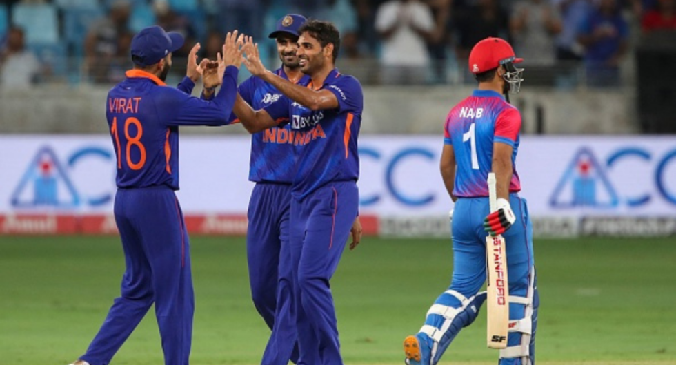 IND vs AFG: India fielders celebrate the wicket of an Afghanistan batter