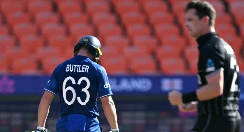 Matt Henry of New Zealand celebrates the wicket of England's Jos Buttler