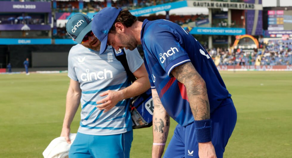 Reece Topley limps off the field
