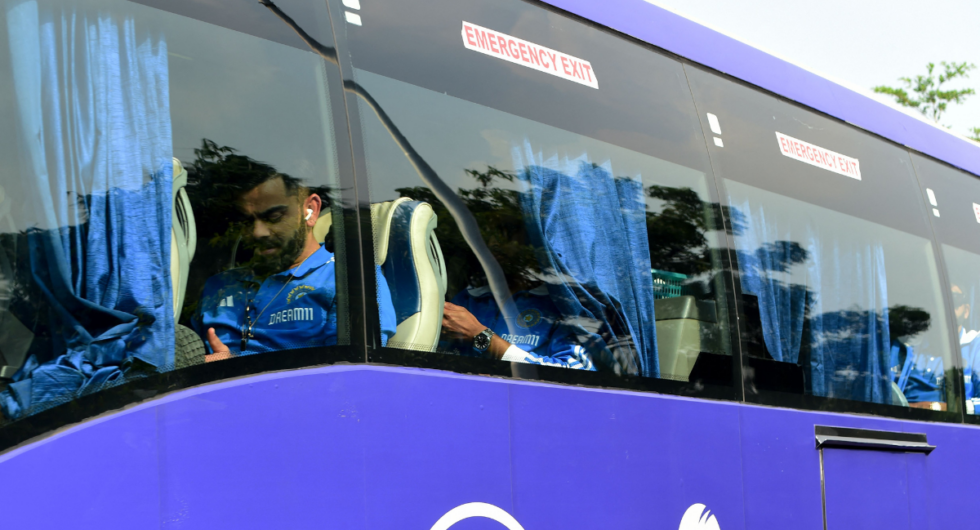 Virat Kohli on the team India bus