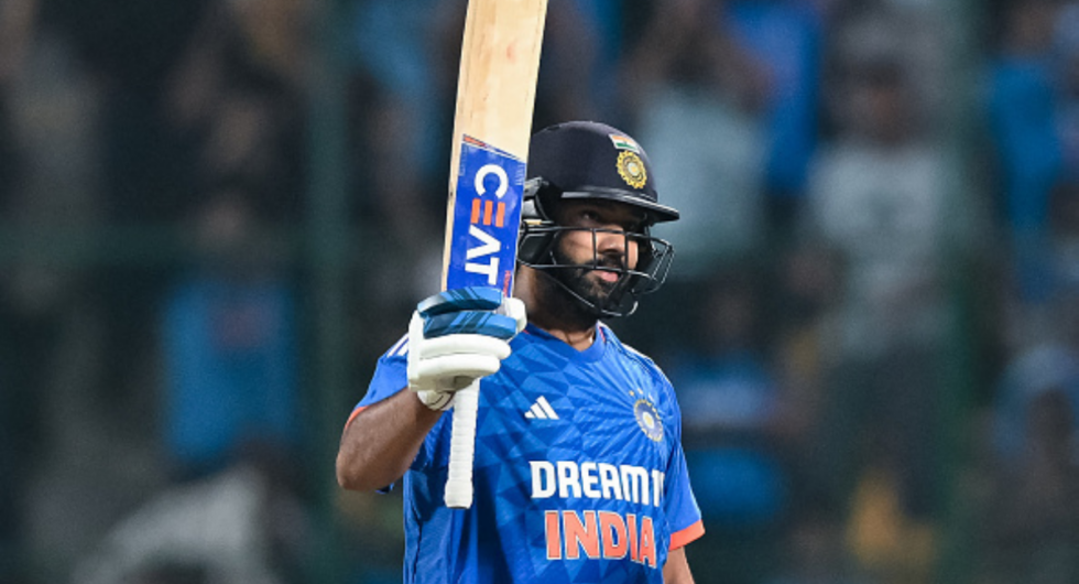 India's captain Rohit Sharma celebrates after scoring a century (100 runs) during the third and final Twenty20 international cricket match between India and Afghanistan at the M. Chinnaswamy Stadium in Bengaluru on January 17, 2024.