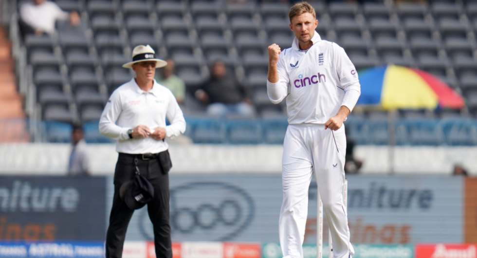 Joe Root celebrates after taking a wicket in the first Test in Hyderabad