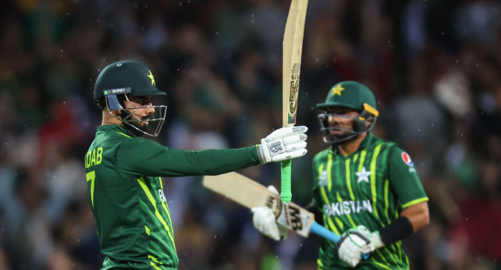 Pakistan's Shadab Khan (L) reacts with teammate Iftikhar Ahmed after reaching fifty during the 2022 ICC Twenty20 World Cup cricket tournament match between Pakistan and South Africa at the Sydney Cricket Ground (SCG) on November 3, 2022.