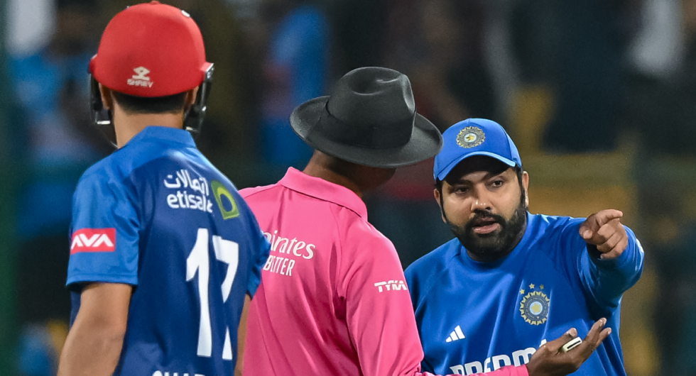 Rohit Sharma, who retired in controversial circumstances, argues with an umpire during the third India-Afghanistan T20I