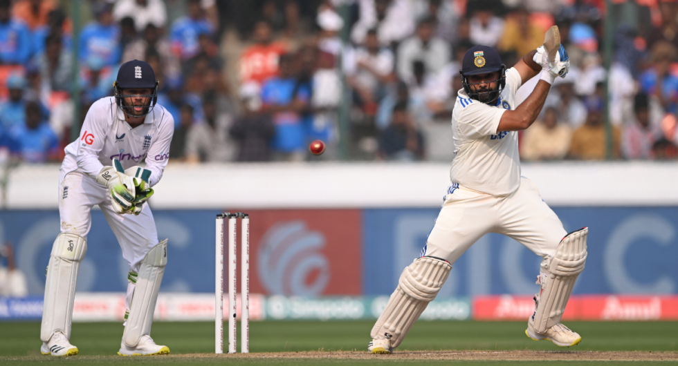 England wicketkeeper Ben Foakes looks on as India batsman Rohit Sharma cuts a ball to the boundary during day one of the 1st Test Match between India and England at Rajiv Gandhi International Stadium on January 25, 2024 in Hyderabad, India.