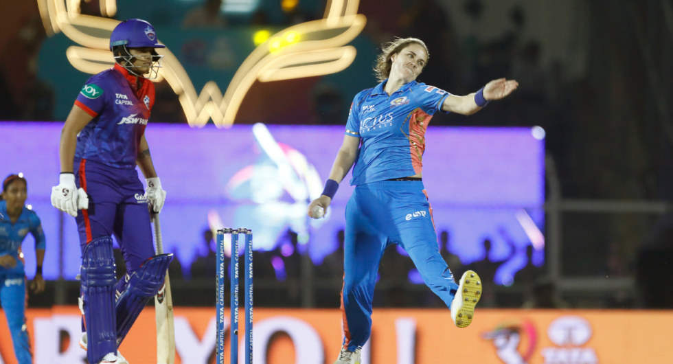 Natalie Sciver of Mumbai Indians bowls during the Women's Premier League final match between Delhi Capitals and Mumbai Indians at Brabourne Stadium on March 26, 2023 in Mumbai, India.