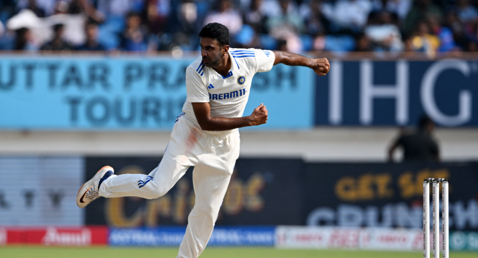 India's Ravichandran Ashwin delivers a ball during the second day of the third Test cricket match between India and England at Niranjan Shah stadium in Rajkot on February 16, 2024.