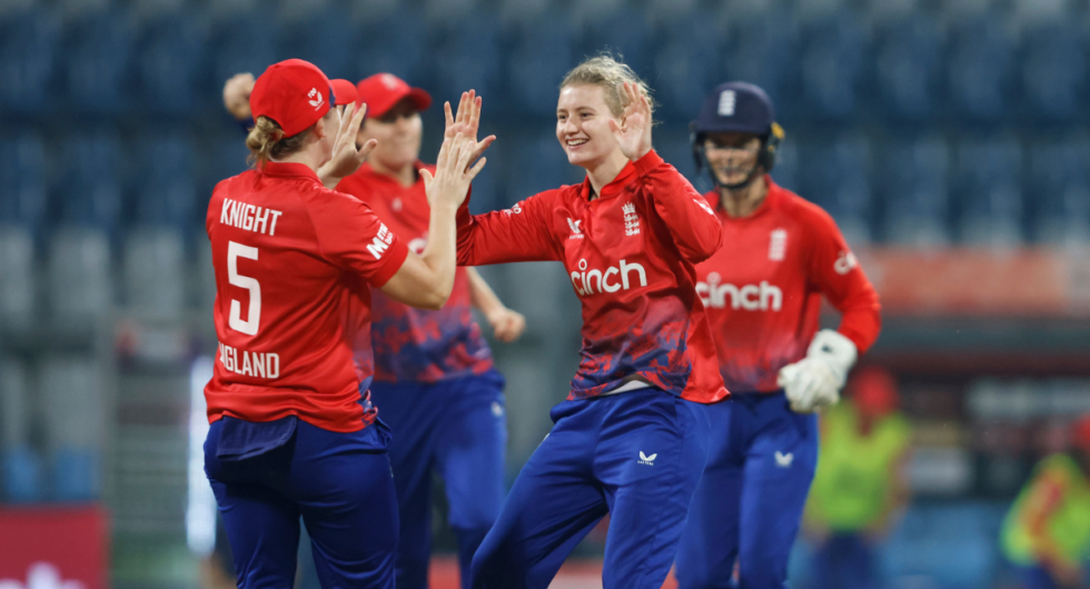 Charlie Dean celebrates playing a T20I for England women