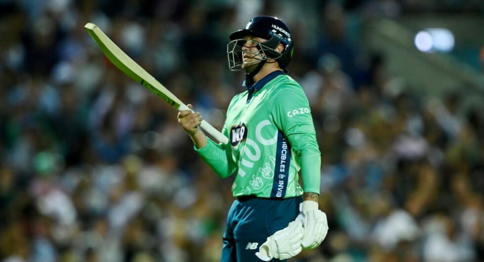 Jason Roy walks off the field in disappointment during the 2023 Hundred