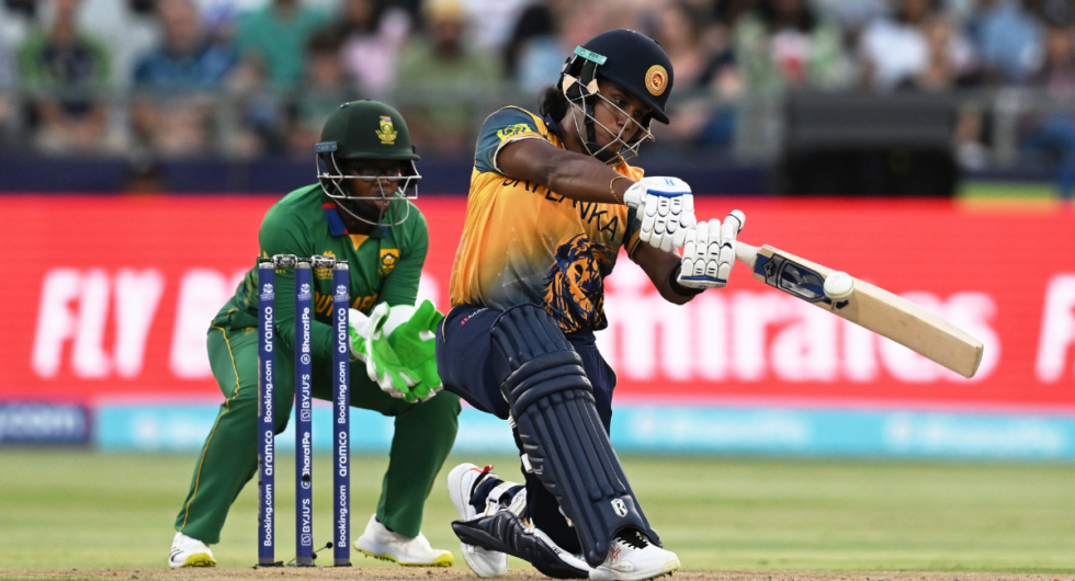 Chamari Athapaththu of Sri Lanka plays a shot as Sinalo Jafta of South Africa keeps during the ICC Women's T20 World Cup group A match between South Africa and Sri Lanka at Newlands Stadium on February 10, 2023 in Cape Town, South Africa.