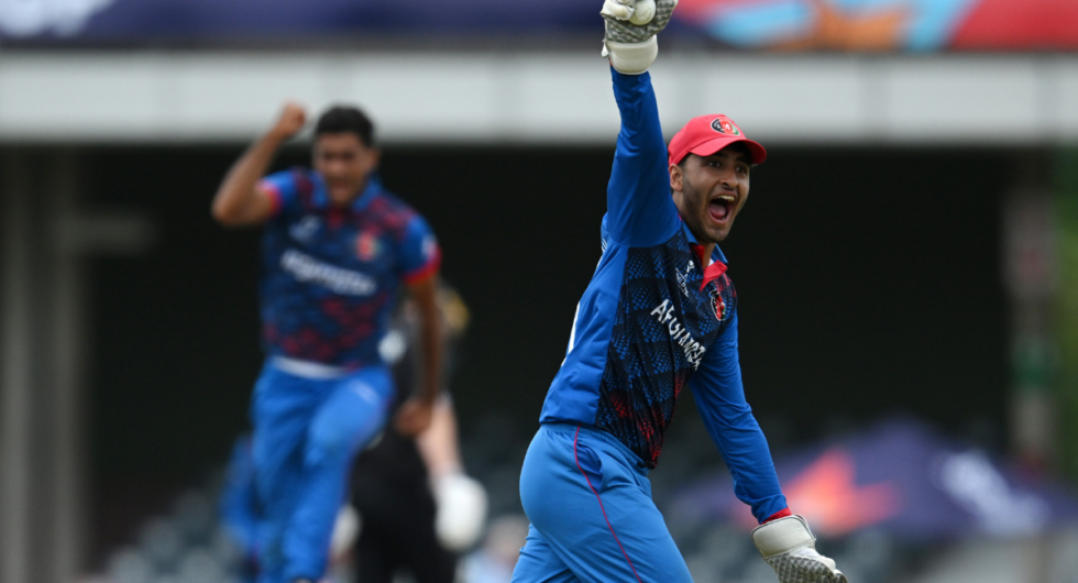 Numan Shah of Afghanistan celebrates the wicket of Lachlan Stackpole of New Zealand during the ICC U19 Men's Cricket World Cup South Africa 2024 match between New Zealand and Afghanistan at Buffalo Park on January 23, 2024 in East London, South Africa.