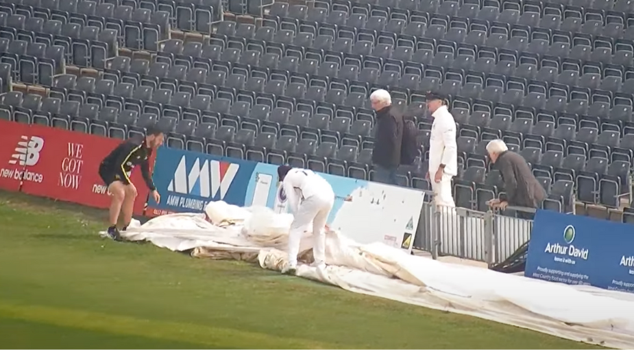 Gloucestershire players search for the lost ball at Bristol