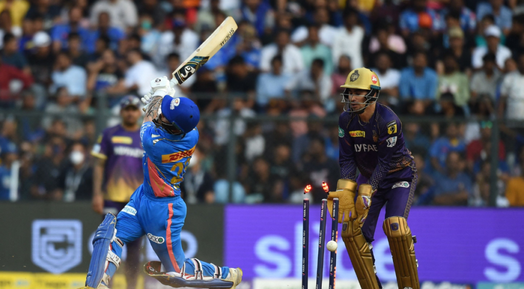 Mumbai Indians' Ishan Kishan (L) is clean bowled during the Indian Premier League (IPL) Twenty20 cricket match between Kolkata Knight Riders and Mumbai Indians at the Wankhede Stadium in Mumbai on April 16, 2023.