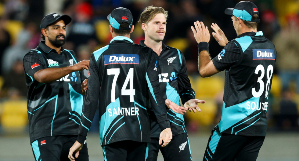 Lockie Ferguson of New Zealand celebrates with Tim Southee after taking the wicket of Glenn Maxwell of Australia during game one of the Men's T20 International series between New Zealand and Australia at Sky Stadium on February 21, 2024 in Wellington, New Zealand.