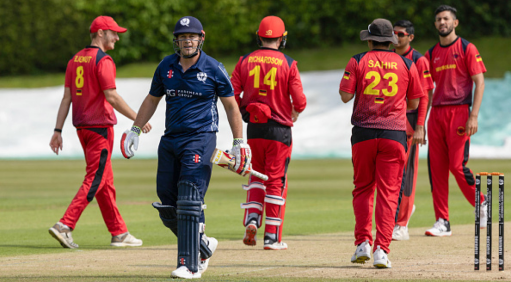 Scotland's Henry Munsey walks off after being bowled out during a ICC T20 World Cup Qualifier between Scotland and Germany at Goldencare, on July 20, 2023, in Edinburgh, Scotland.